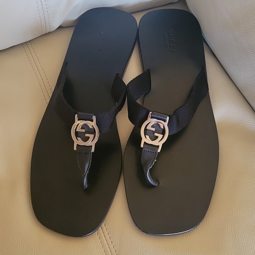 Gucci Black Flats with Silver Emblem